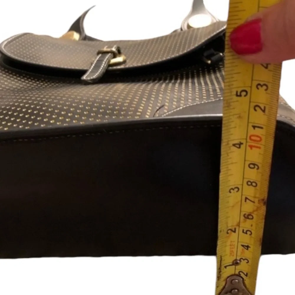Dooney & Bourke Cabrio black leather laser cut w/ tag & serial number, vintage